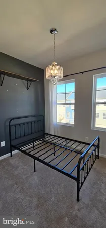 a view of a chandelier in big room