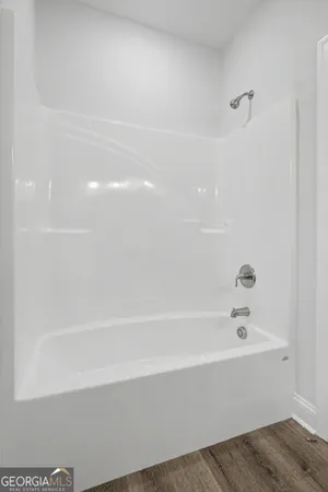 a bathroom with a bathtub