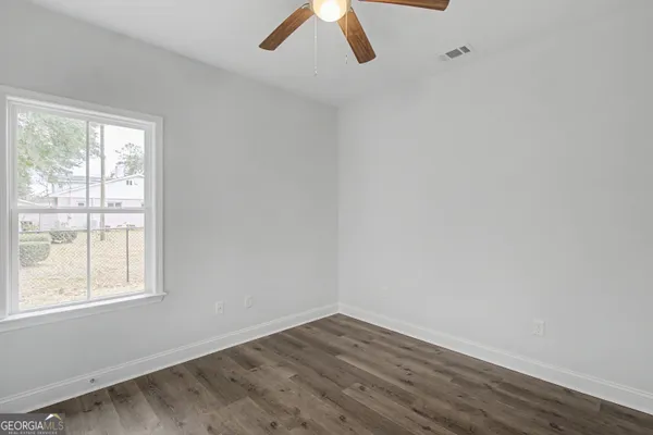 an empty room with a window