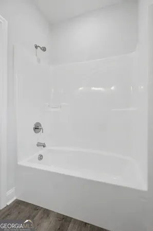 a bathroom with a bathtub