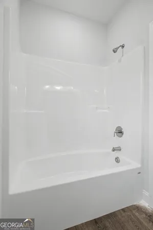a bathroom with a bathtub