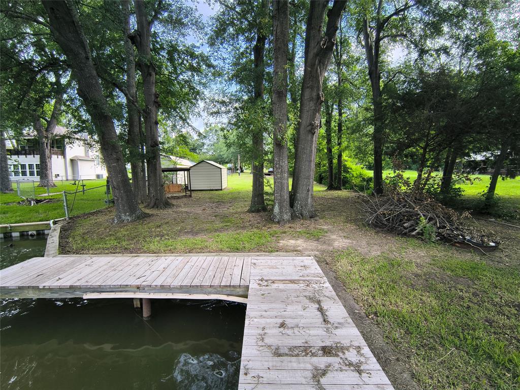 180 Arrowhead Street Mabank, TX 75156 - Photo 17 of 26 a view of backyard with green space