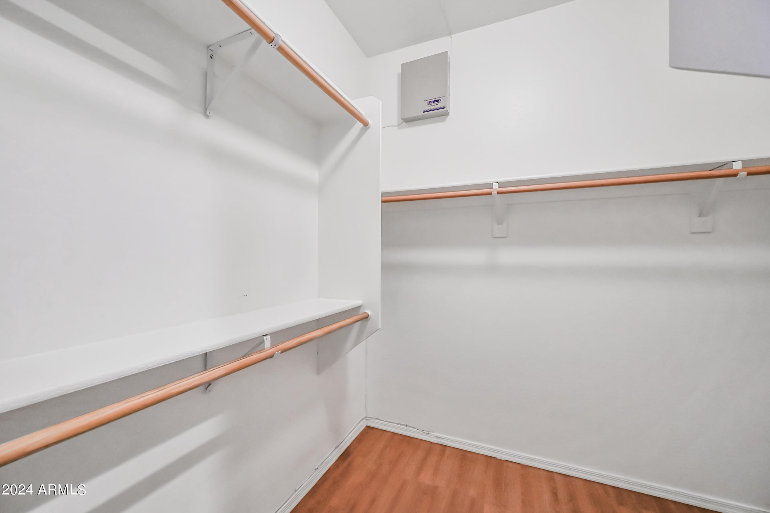 6707 East Roland Street Mesa, AZ 85215 - Photo 24 of 32 a view of small space with racks on the wall