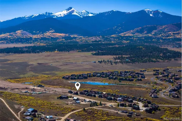 a view of a city with an ocean