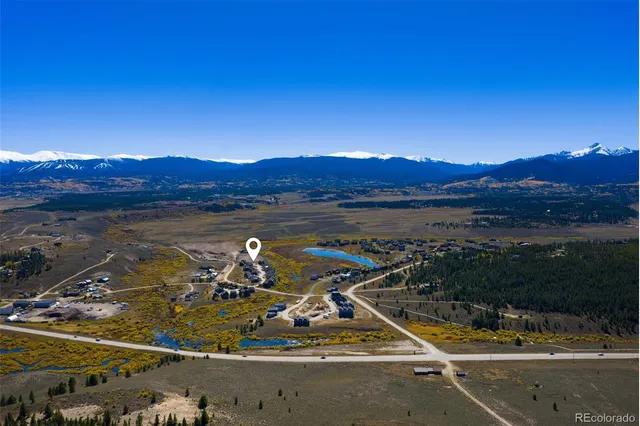a view of a lake in middle of the town