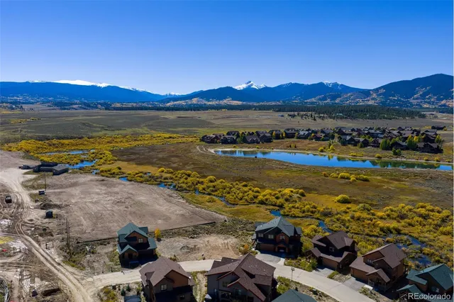 a view of an ocean and a mountain