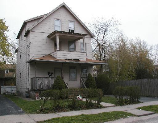 514 Midland Street Bridgeport, CT 06605 - Photo 1 of 1 a front view of a house with garden