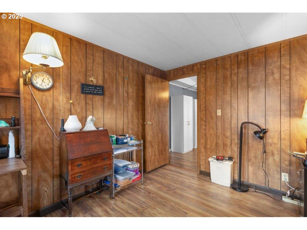 406 Shadow Ranch Lane Roseburg, OR 97470 - Photo 16 of 32 a living room with furniture and a chandelier