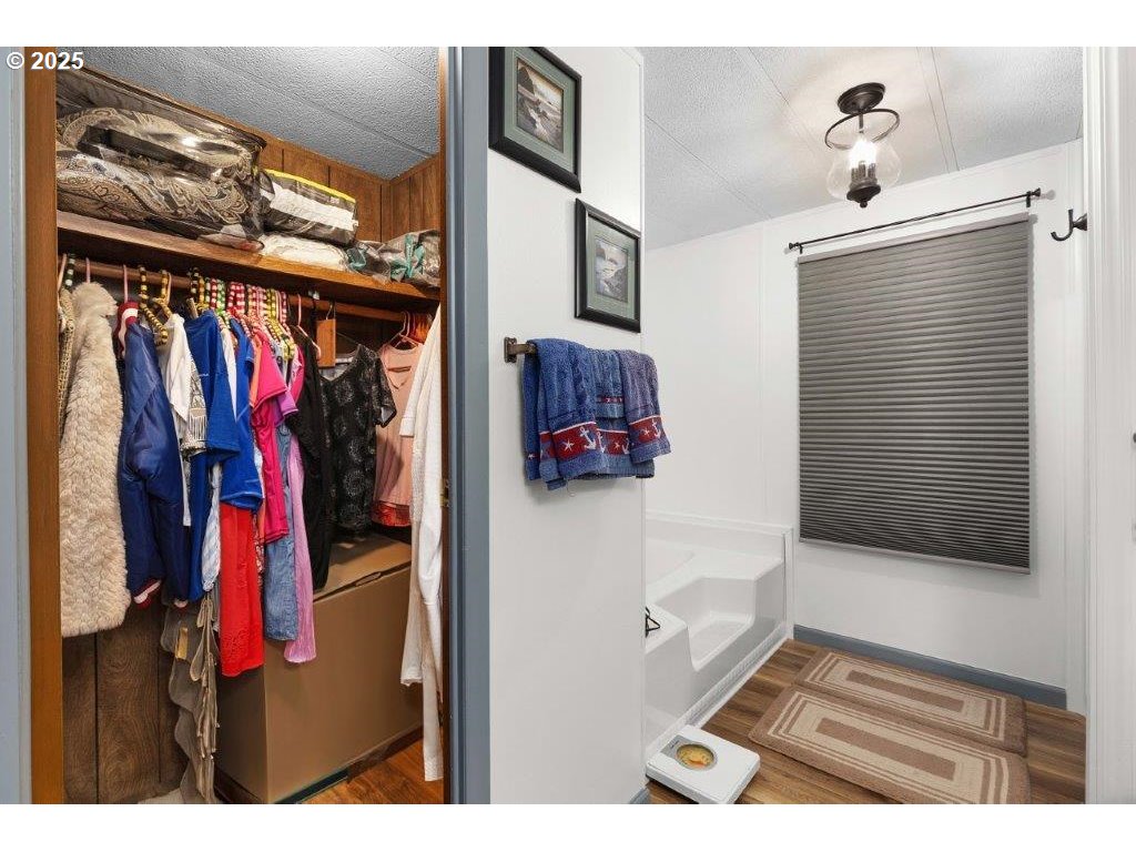 406 Shadow Ranch Lane Roseburg, OR 97470 - Photo 23 of 32 a view of walk in closet with clothes and shoes