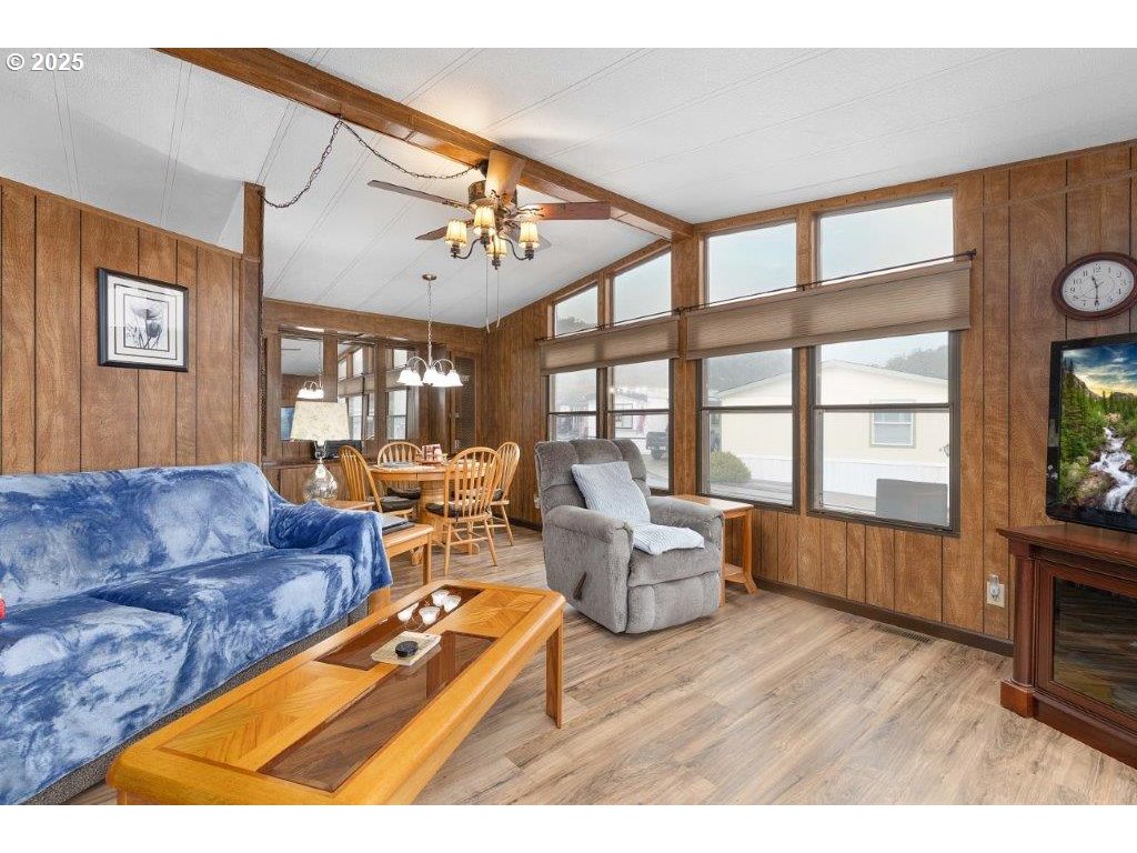 406 Shadow Ranch Lane Roseburg, OR 97470 - Photo 9 of 32 a living room with furniture and wooden floor