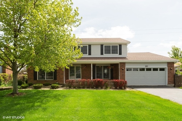3561 Ronald Road Crete, IL 60417 - Photo 1 of 18 a front view of a house with a garden