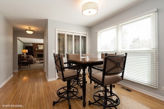 3561 Ronald Road Crete, IL 60417 - Photo 4 of 18 a view of a dining room with furniture window and wooden floor