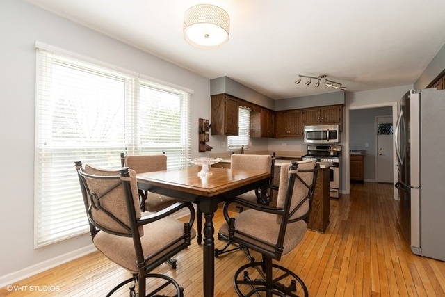 3561 Ronald Road Crete, IL 60417 - Photo 5 of 18 a view of a dining room with furniture and wooden floor
