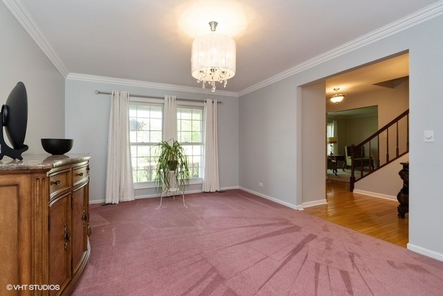 3561 Ronald Road Crete, IL 60417 - Photo 6 of 18 a view of a livingroom with furniture hardwood floor and a ceiling fan