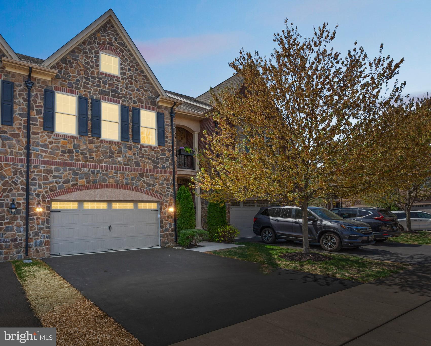 52 David Drive Newtown, PA 18940 - Photo 1 of 32 a front view of a house with a yard and garage