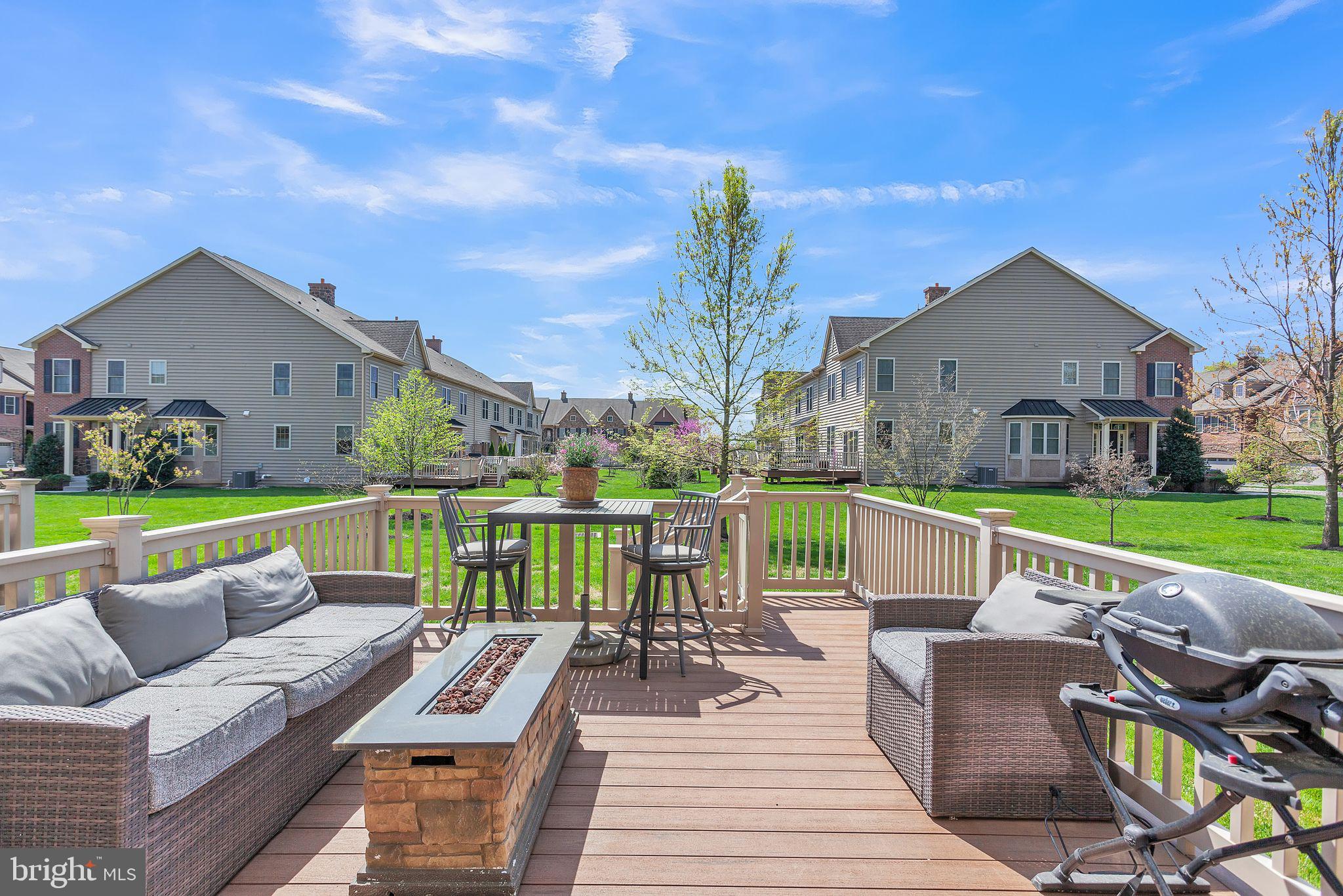 52 David Drive Newtown, PA 18940 - Photo 11 of 32 a view of a patio with couches chairs and a table