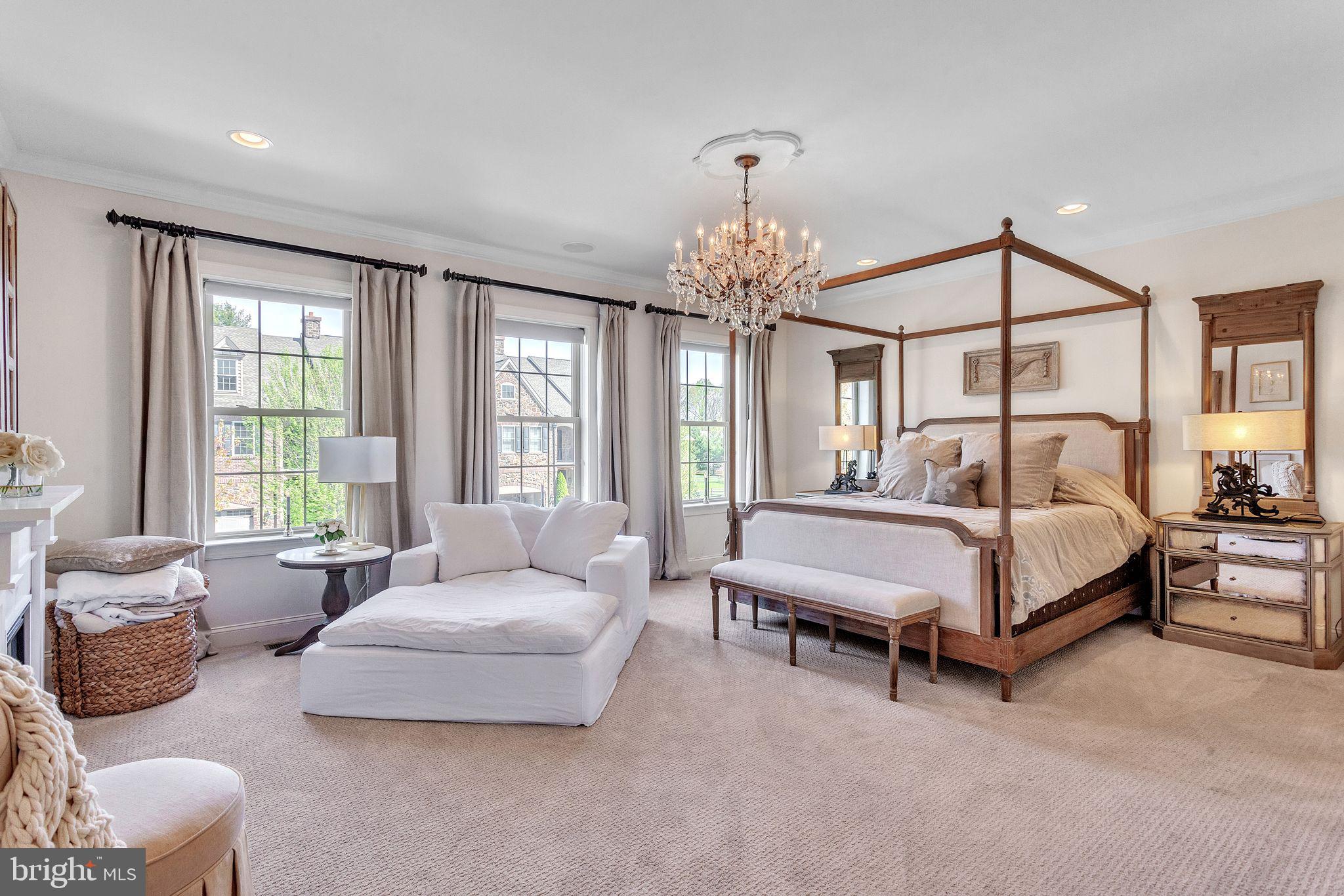 52 David Drive Newtown, PA 18940 - Photo 14 of 32 a spacious bedroom with a bed and glass windows