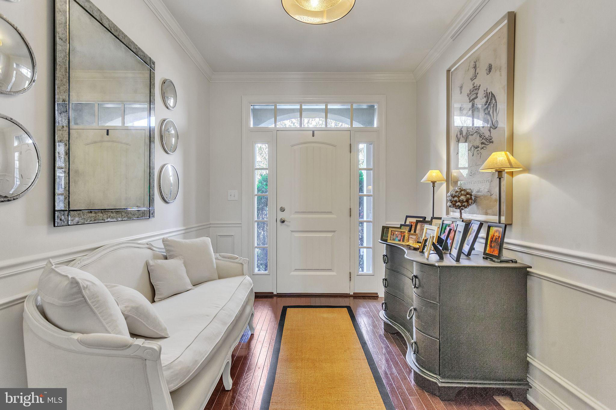 52 David Drive Newtown, PA 18940 - Photo 2 of 32 a living room with furniture and a chandelier