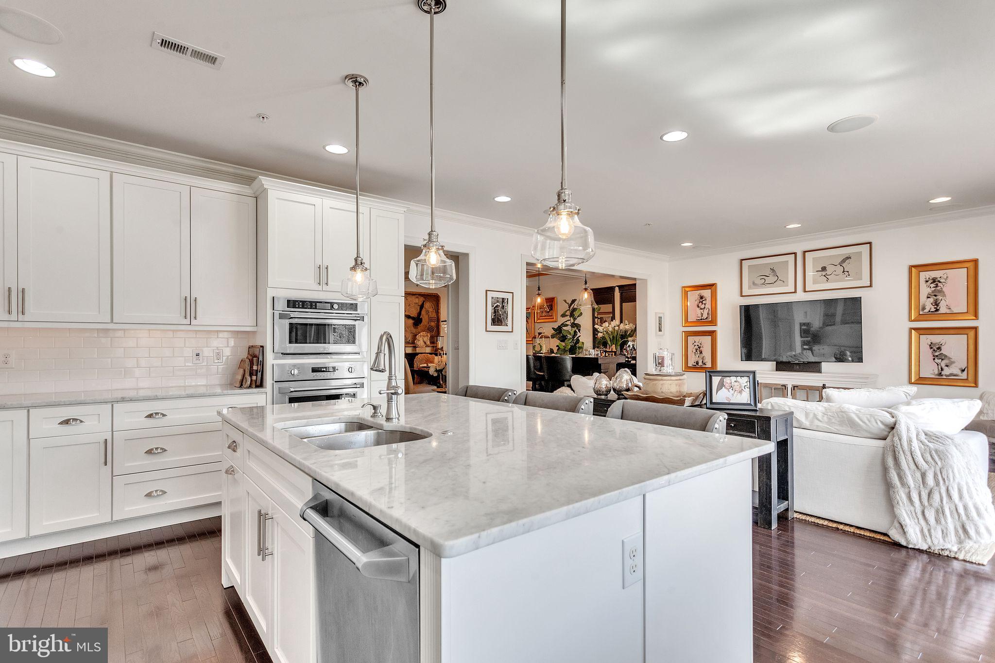 52 David Drive Newtown, PA 18940 - Photo 7 of 32 a kitchen with counter space appliances and a view of living room