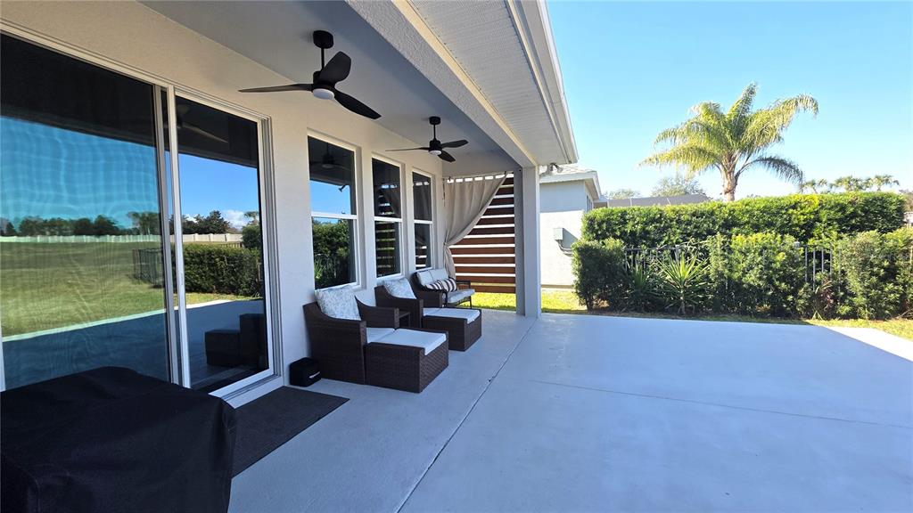 5531 Cypress Hill Road Winter Garden, FL 34787 - Photo 3 of 62 a view of a patio with couches and potted plants