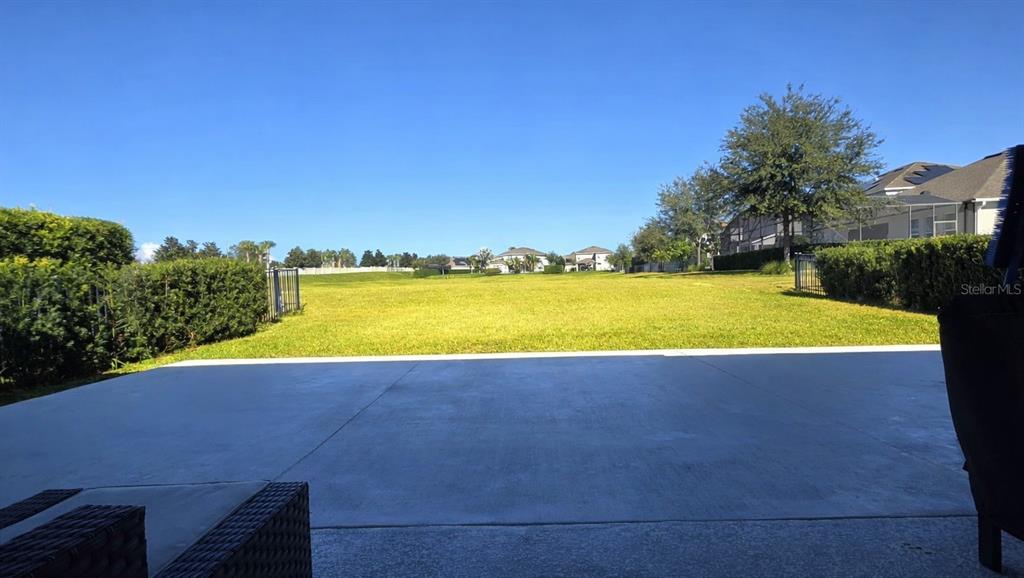5531 Cypress Hill Road Winter Garden, FL 34787 - Photo 4 of 62 a view of a swimming pool with an ocean view