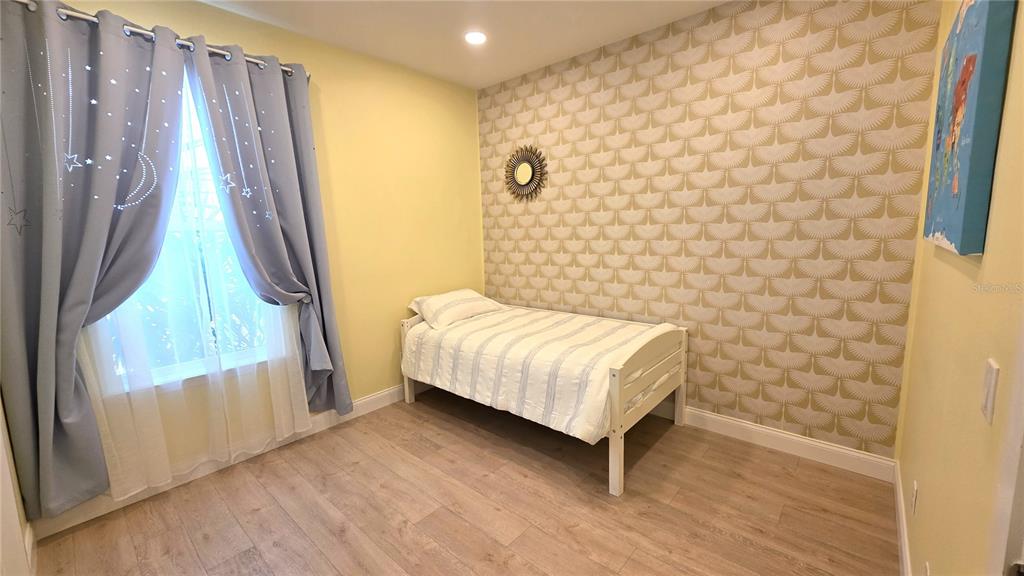 5531 Cypress Hill Road Winter Garden, FL 34787 - Photo 47 of 62 a bathroom with a sink and a shower