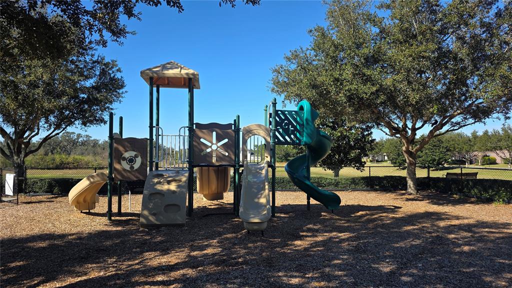5531 Cypress Hill Road Winter Garden, FL 34787 - Photo 54 of 62 a view of a park with iron fence
