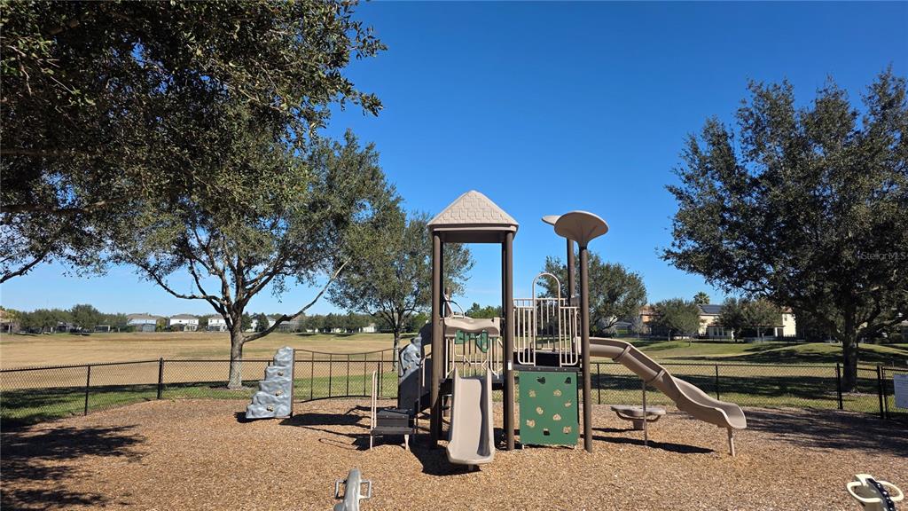 5531 Cypress Hill Road Winter Garden, FL 34787 - Photo 55 of 62 a view of a house with a park