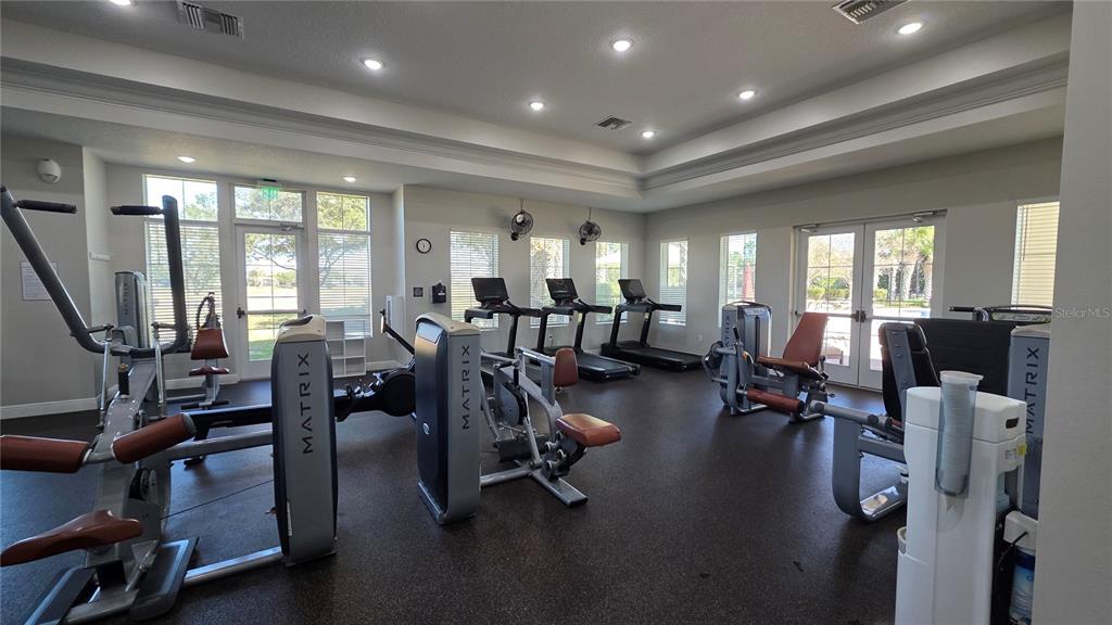 5531 Cypress Hill Road Winter Garden, FL 34787 - Photo 58 of 62 a view of a room with gym equipment