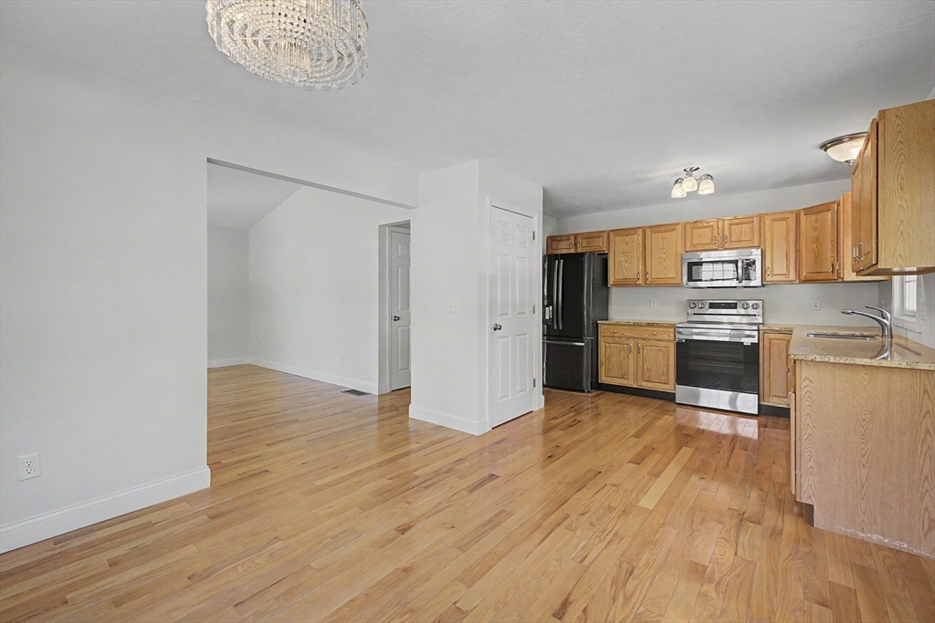 792 Ryan Road Northampton, MA 01062 - Photo 8 of 29 a view of kitchen with wooden floor