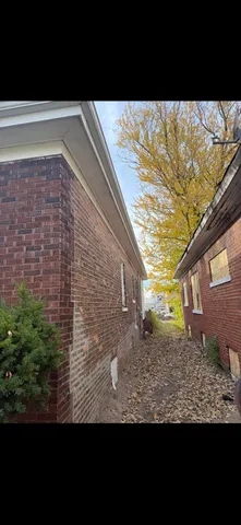 a view of backyard with green space