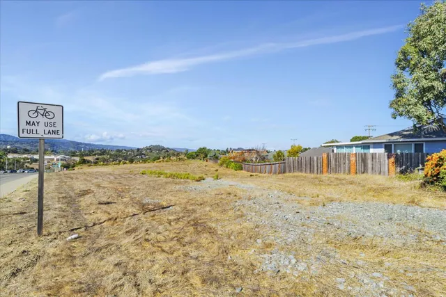 a view of lake with mountain in the background