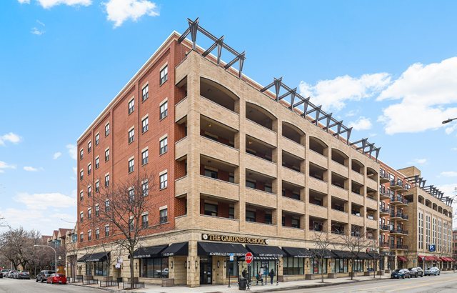 1301 West Madison Street, Unit 408 Chicago, IL 60607 - Photo 1 of 21 a front view of a building