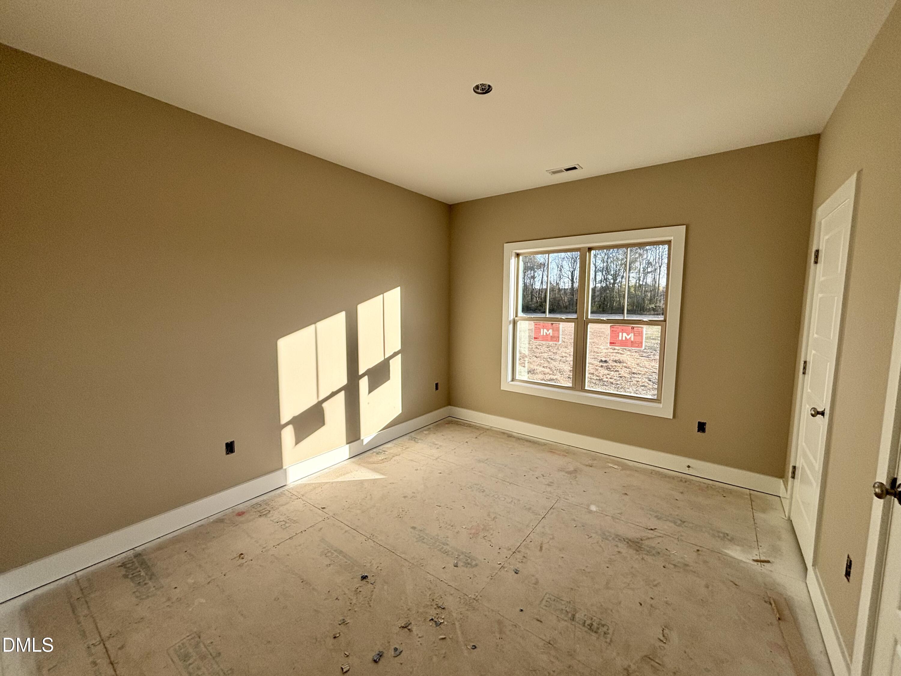 1448 Union Grove Church Road Fremont, NC 27830 - Photo 14 of 21 a view of an empty room with a window