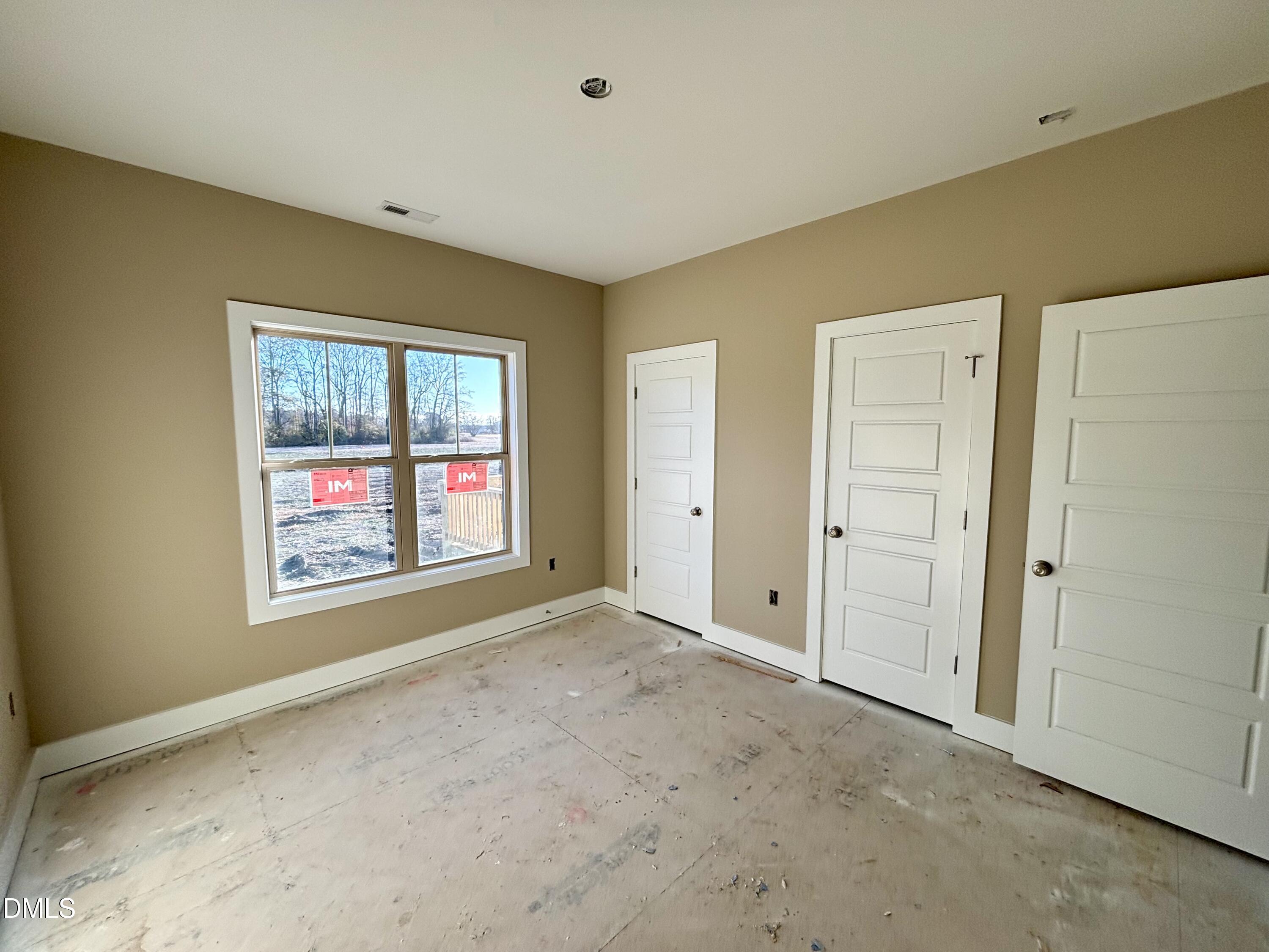 1448 Union Grove Church Road Fremont, NC 27830 - Photo 16 of 21 an empty room with windows and closet
