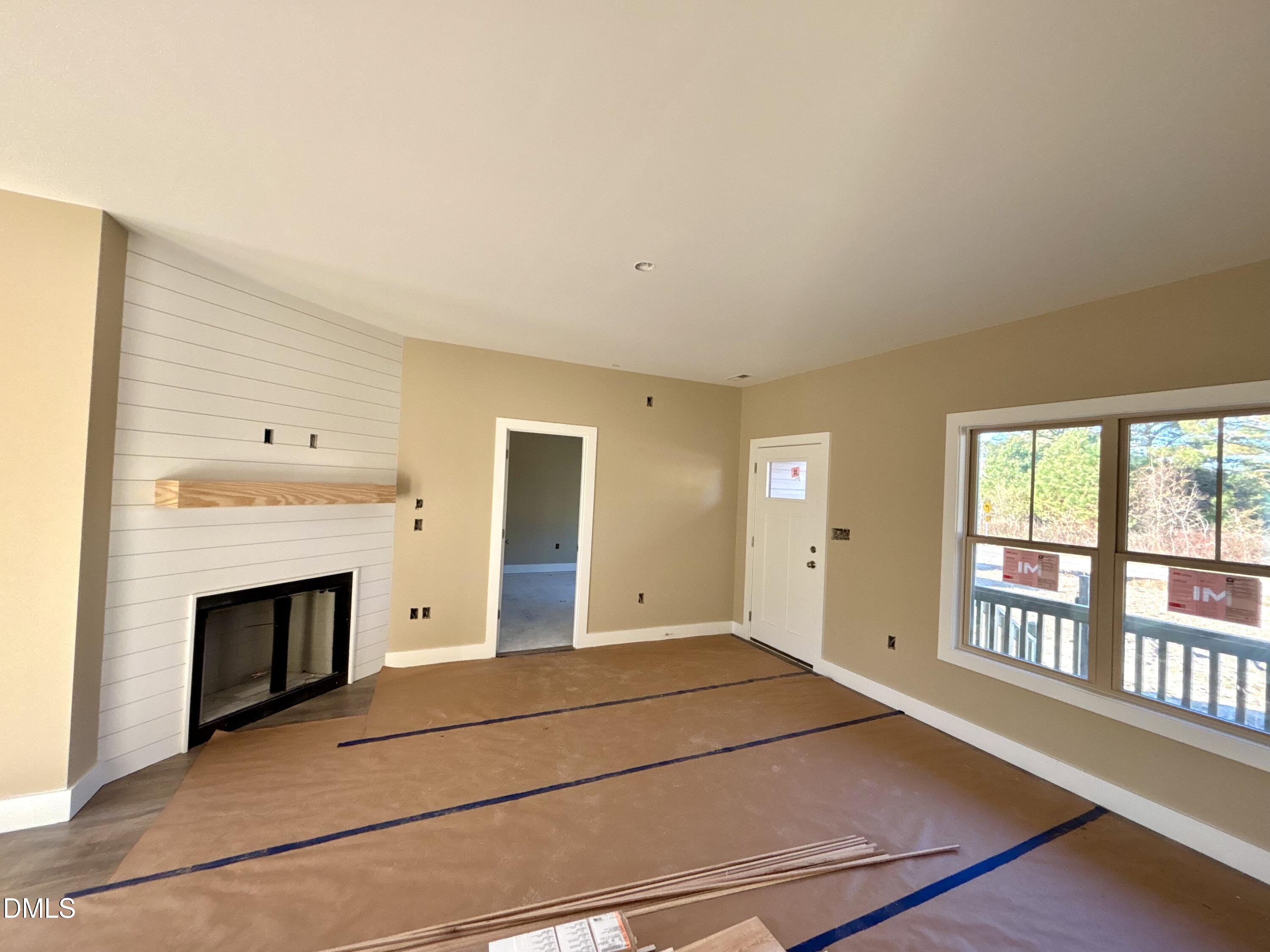 1448 Union Grove Church Road Fremont, NC 27830 - Photo 4 of 21 a bedroom with a bed and a fireplace