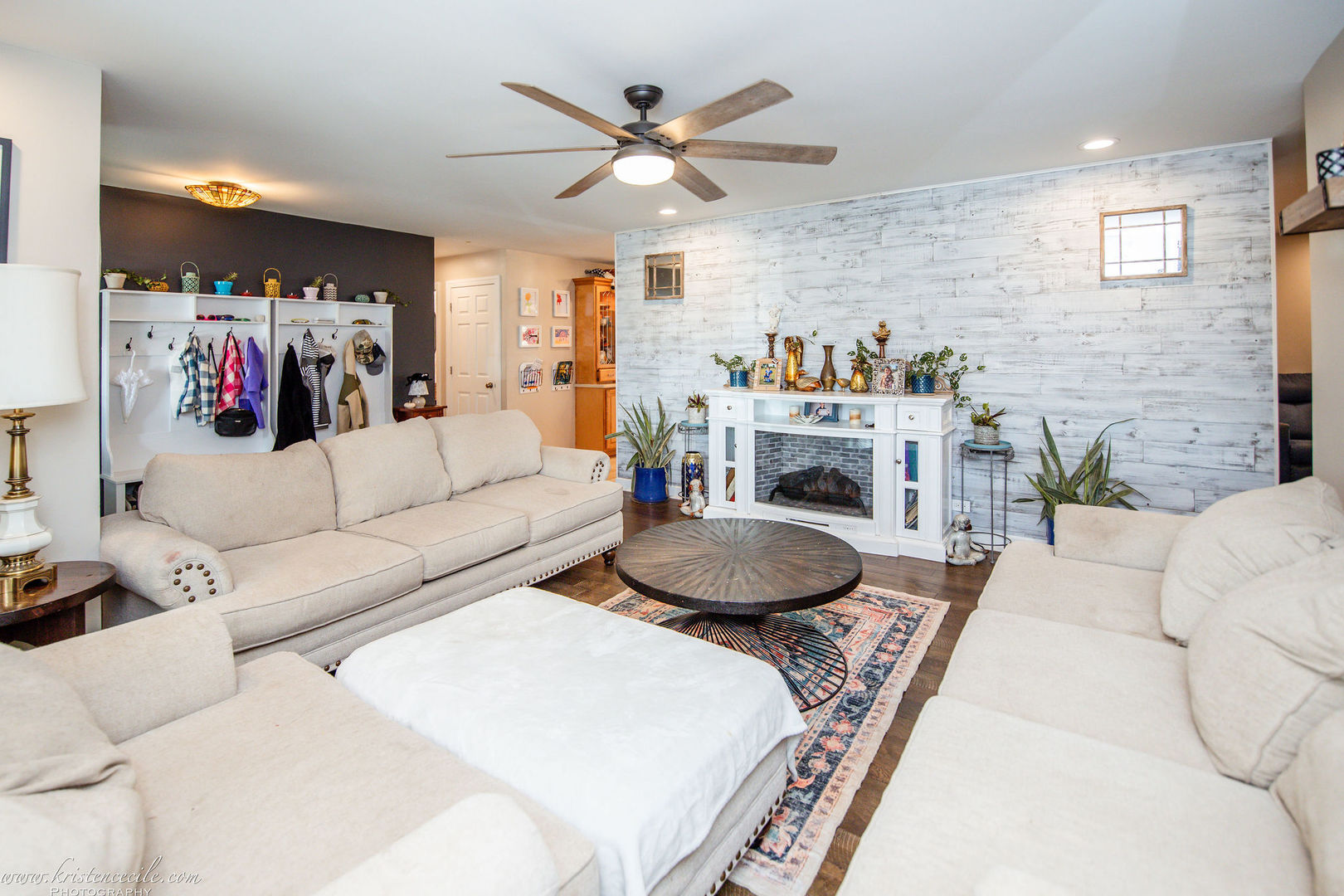 936 West Corning Road Beecher, IL 60401 - Photo 12 of 72 a living room with furniture a fireplace and a ceiling fan