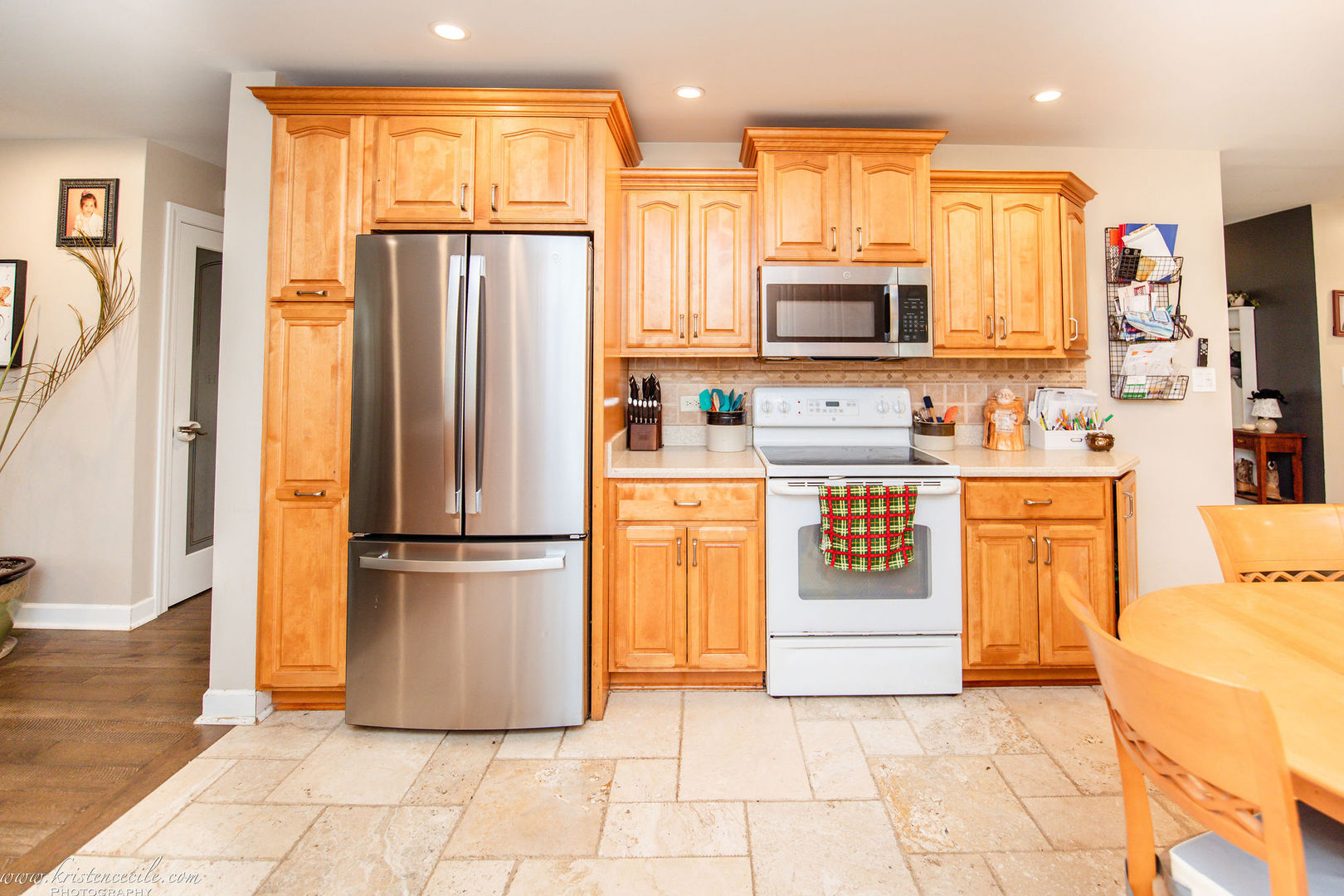 936 West Corning Road Beecher, IL 60401 - Photo 18 of 72 a kitchen with stainless steel appliances a refrigerator sink and cabinets