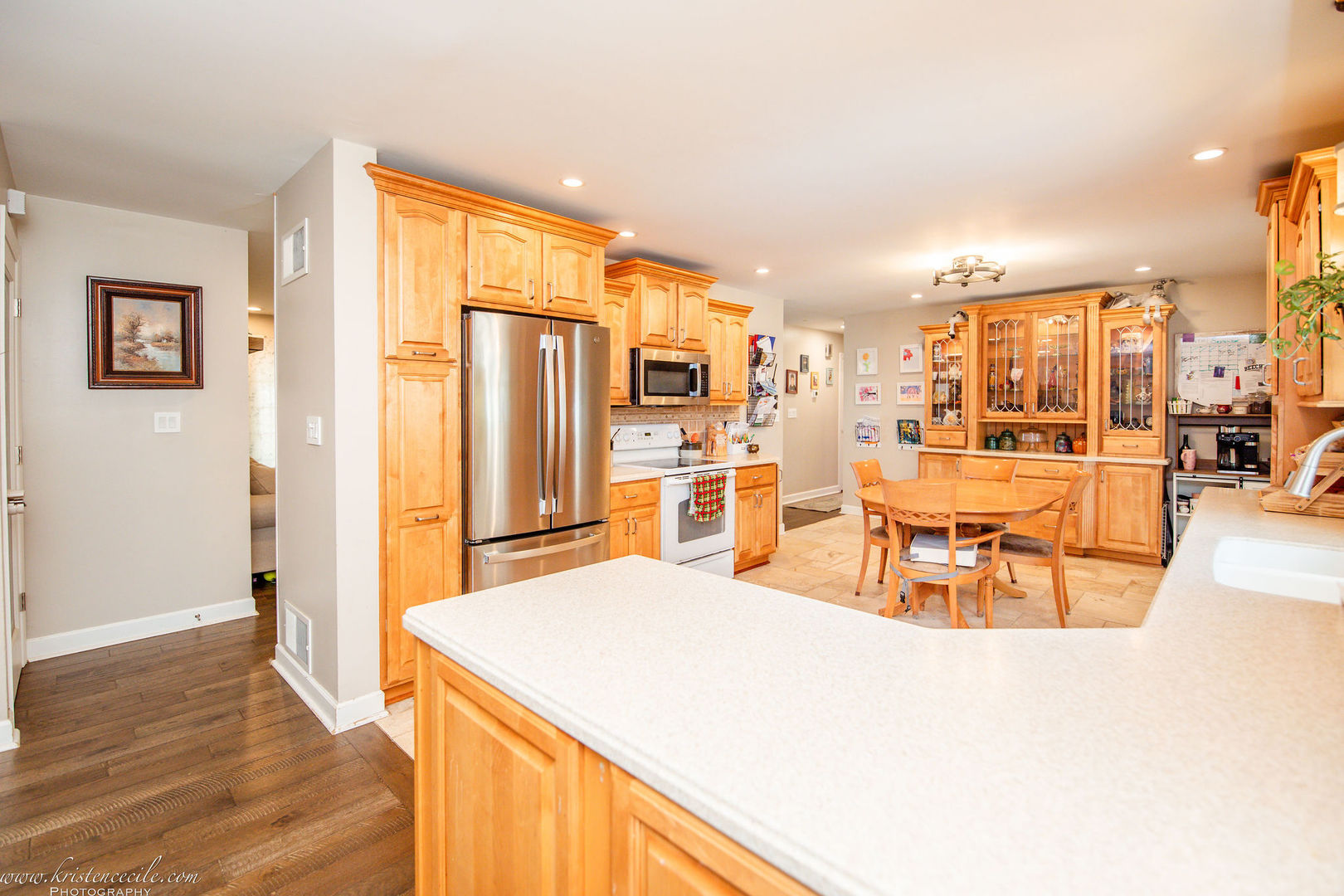 936 West Corning Road Beecher, IL 60401 - Photo 20 of 72 a living room with stainless steel appliances kitchen island granite countertop furniture and a kitchen view