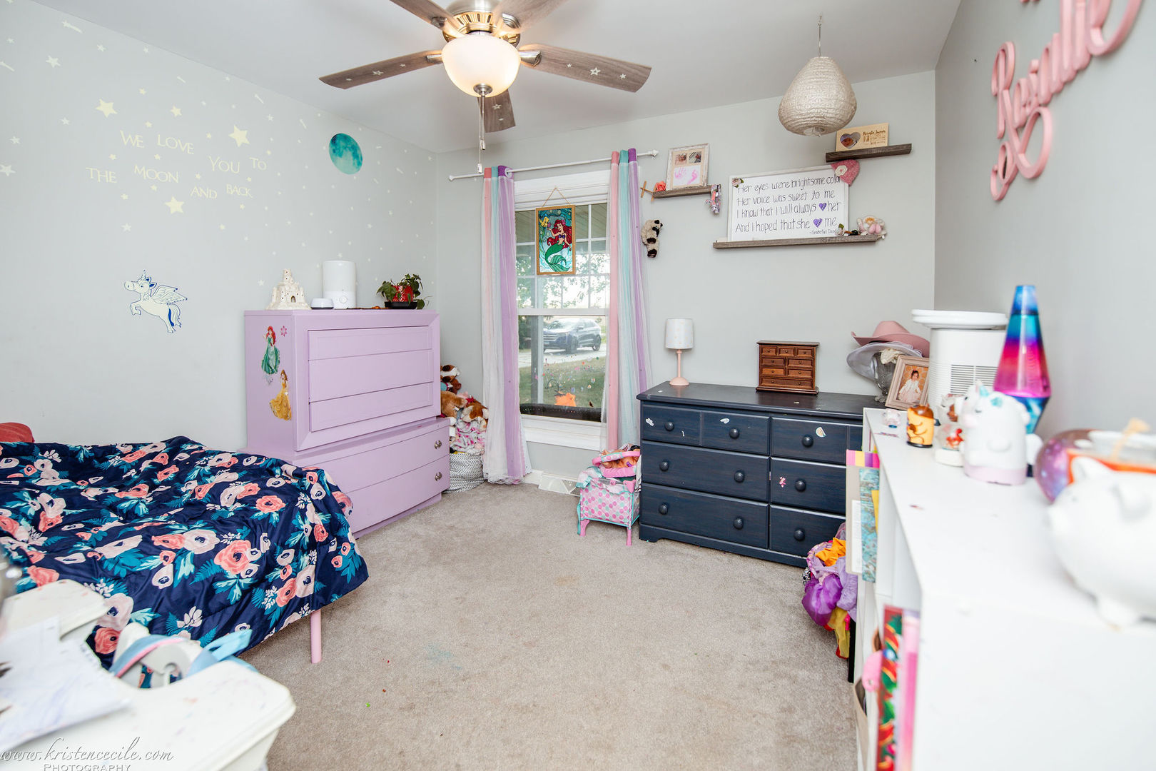 936 West Corning Road Beecher, IL 60401 - Photo 28 of 72 a bedroom with a dresser and a chandelier