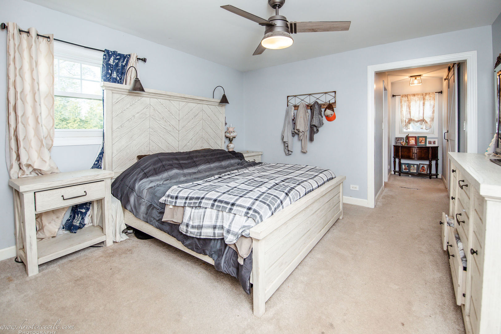 936 West Corning Road Beecher, IL 60401 - Photo 32 of 72 a bedroom with a bed and a chandelier