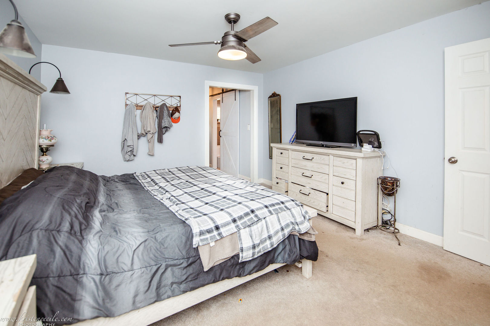 936 West Corning Road Beecher, IL 60401 - Photo 34 of 72 a bedroom with a bed and a flat screen tv