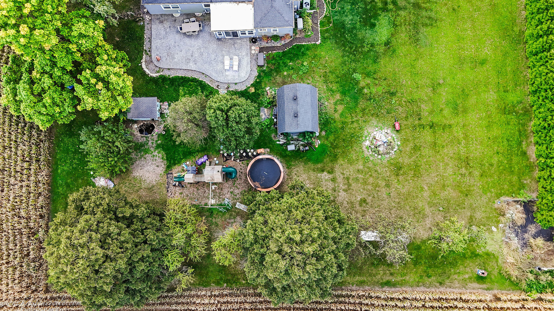 936 West Corning Road Beecher, IL 60401 - Photo 68 of 72 an aerial view of a house with a yard basket ball court and outdoor seating