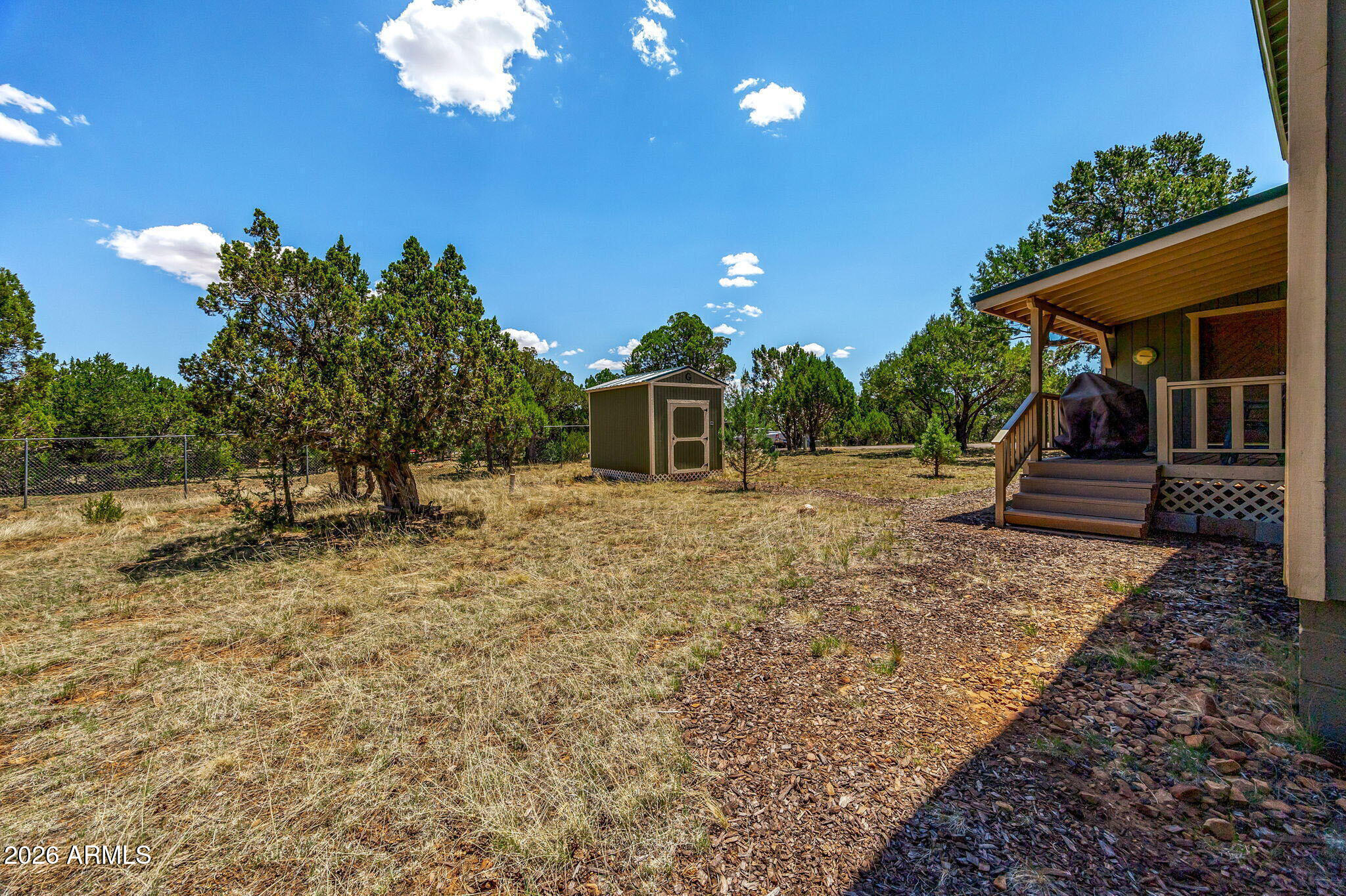 3475 Roundup Circle Heber, AZ 85928 - Photo 22 of 34 a front view of a house with a yard