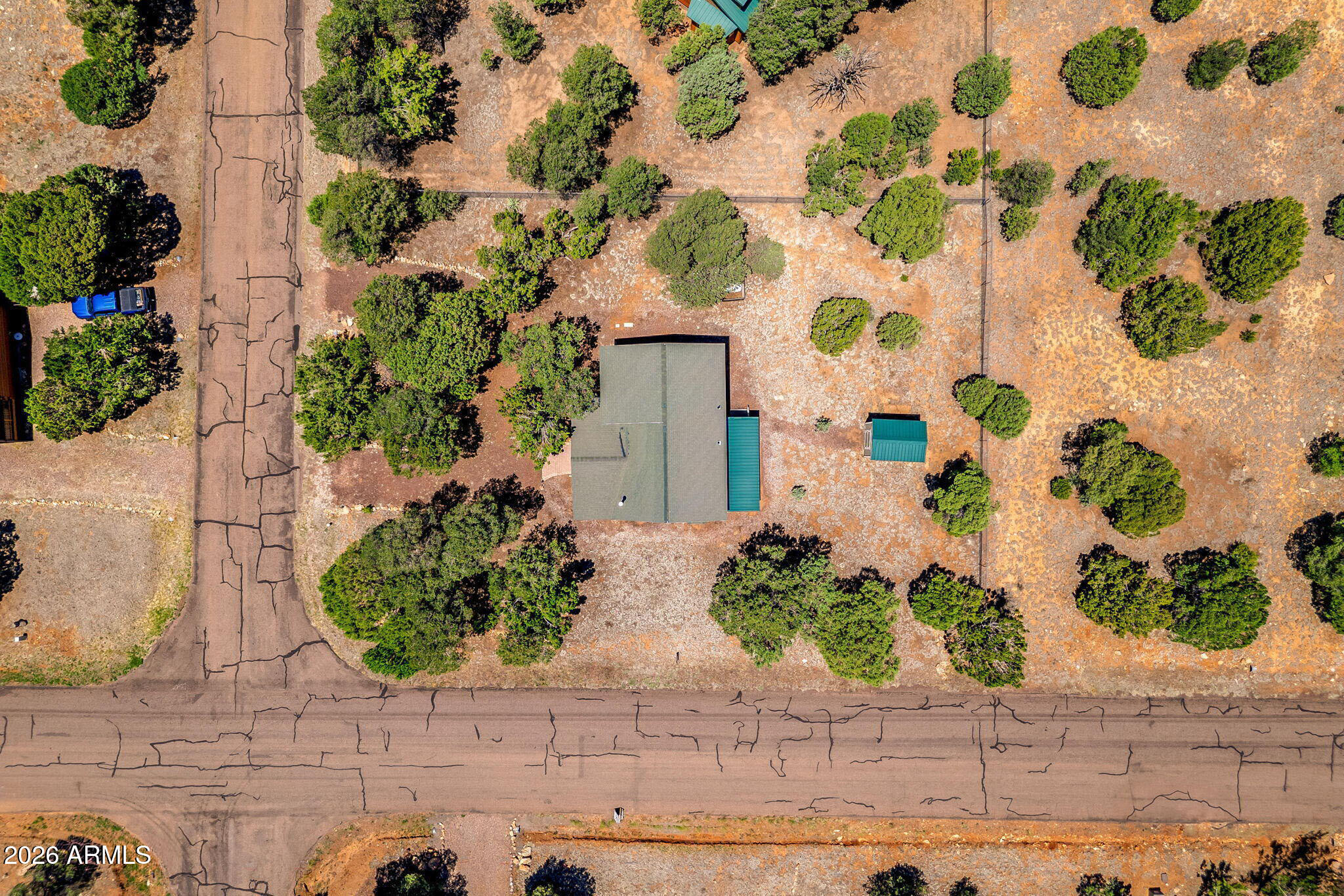 3475 Roundup Circle Heber, AZ 85928 - Photo 27 of 34 a front view of a house with a garden