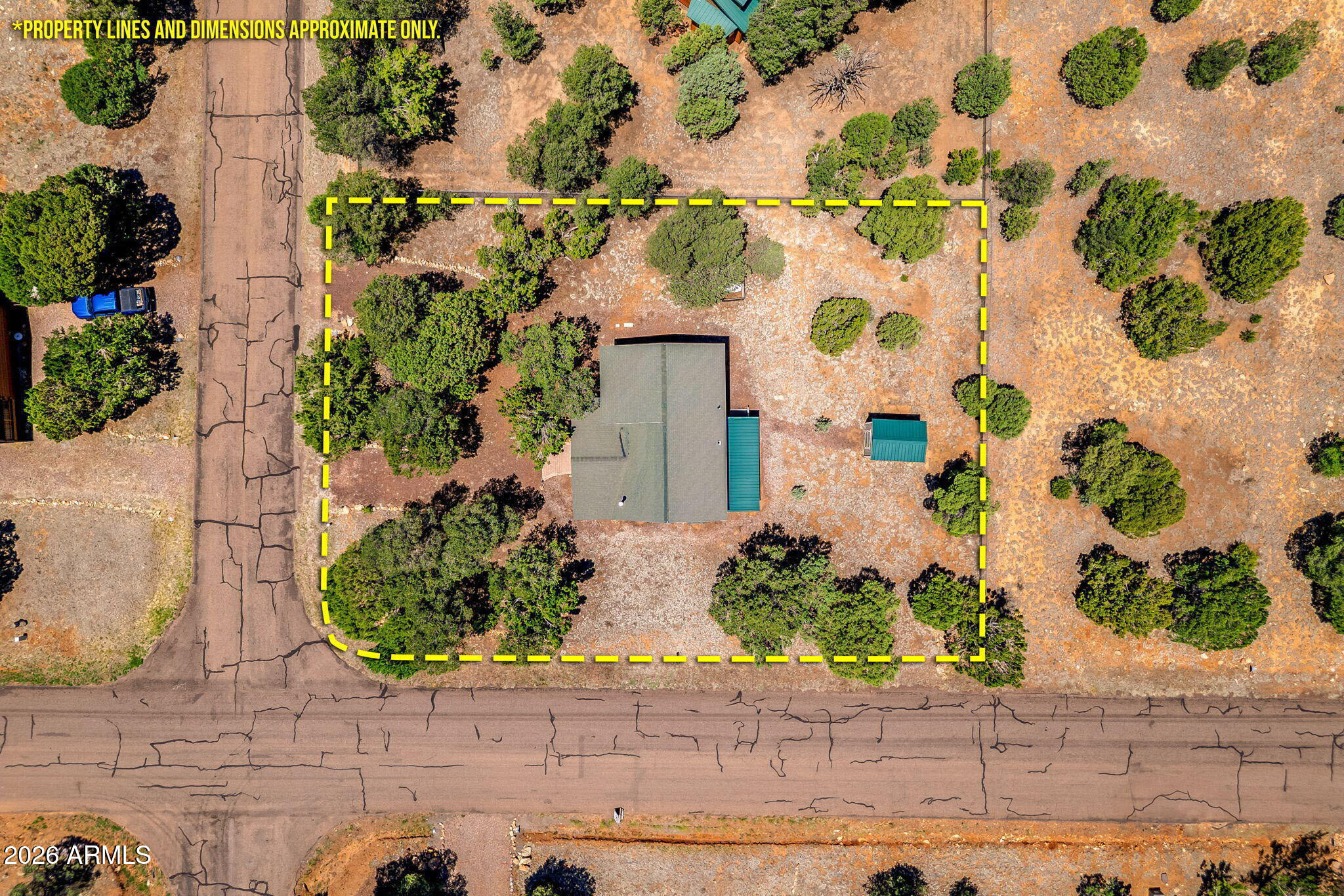 3475 Roundup Circle Heber, AZ 85928 - Photo 31 of 34 a front view of a house with a garden