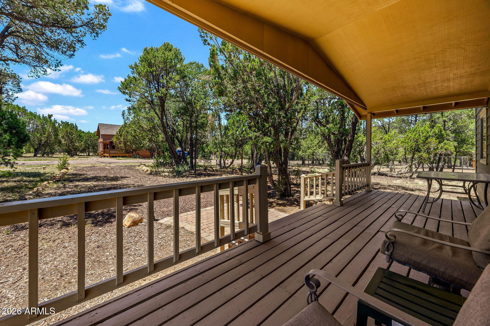 3475 Roundup Circle Heber, AZ 85928 - Photo 5 of 34 a view of a balcony with wooden floor