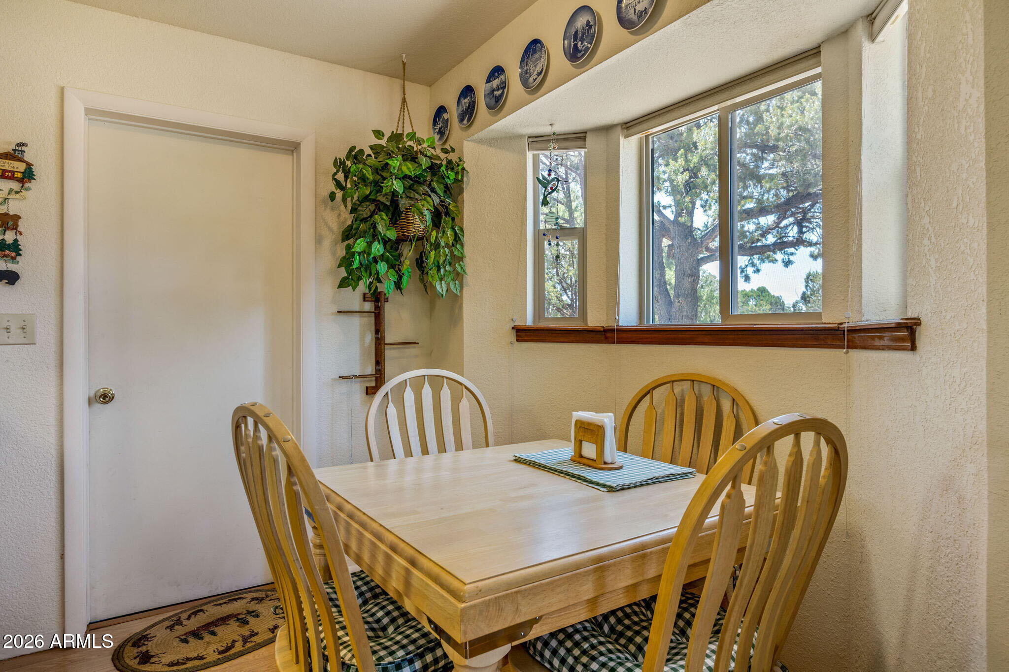 3475 Roundup Circle Heber, AZ 85928 - Photo 9 of 34 a view of a dining room with furniture and window