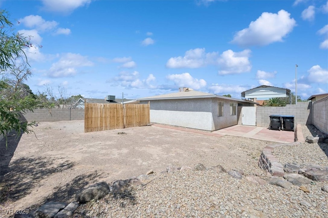 460 Crestway Road Henderson, NV 89015 - Photo 38 of 41 Back of property featuring a fenced backyard, a patio area, and stucco siding