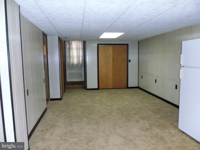 8010 Sagramore Road Rosedale, MD 21237 - Photo 11 of 14 a view of an empty room with a window